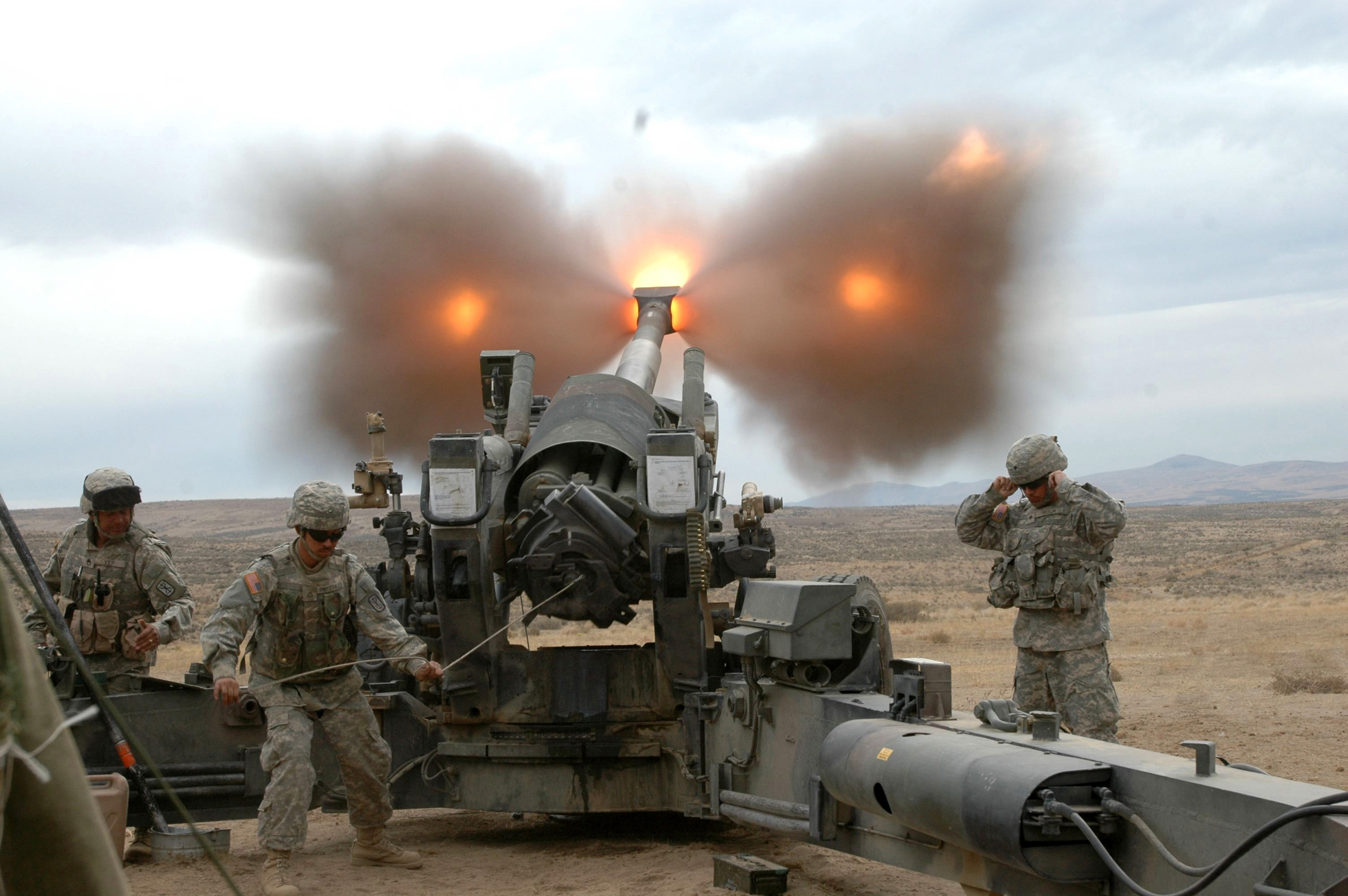 Soldiers with Charlie Battery, 1-377 FA fire an M198, 155mm howitzer