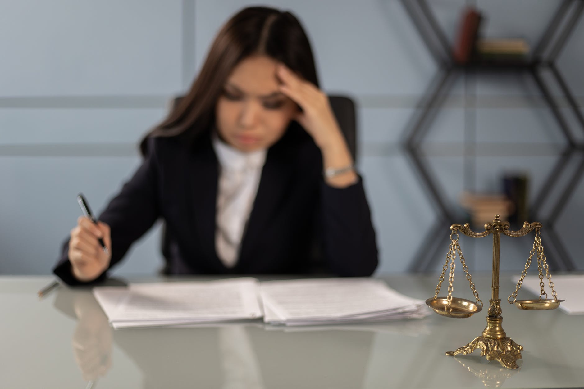 an exhausted lawyer reading the case paper